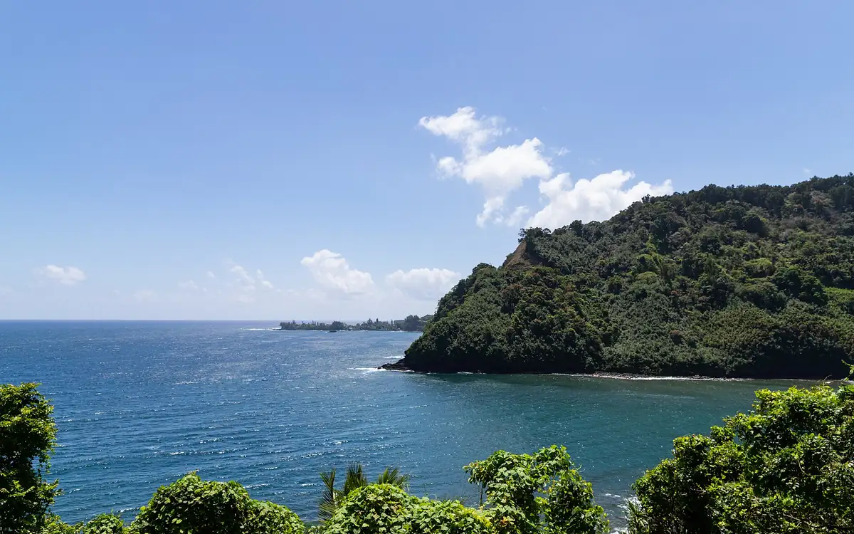 Green headland and blue ocean along the Road to Hana on Maui